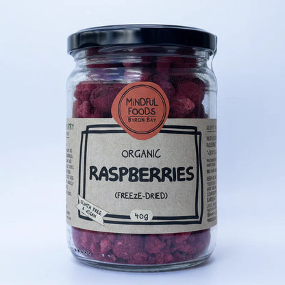 Jar of freeze-dried raspberries with a label on a white background